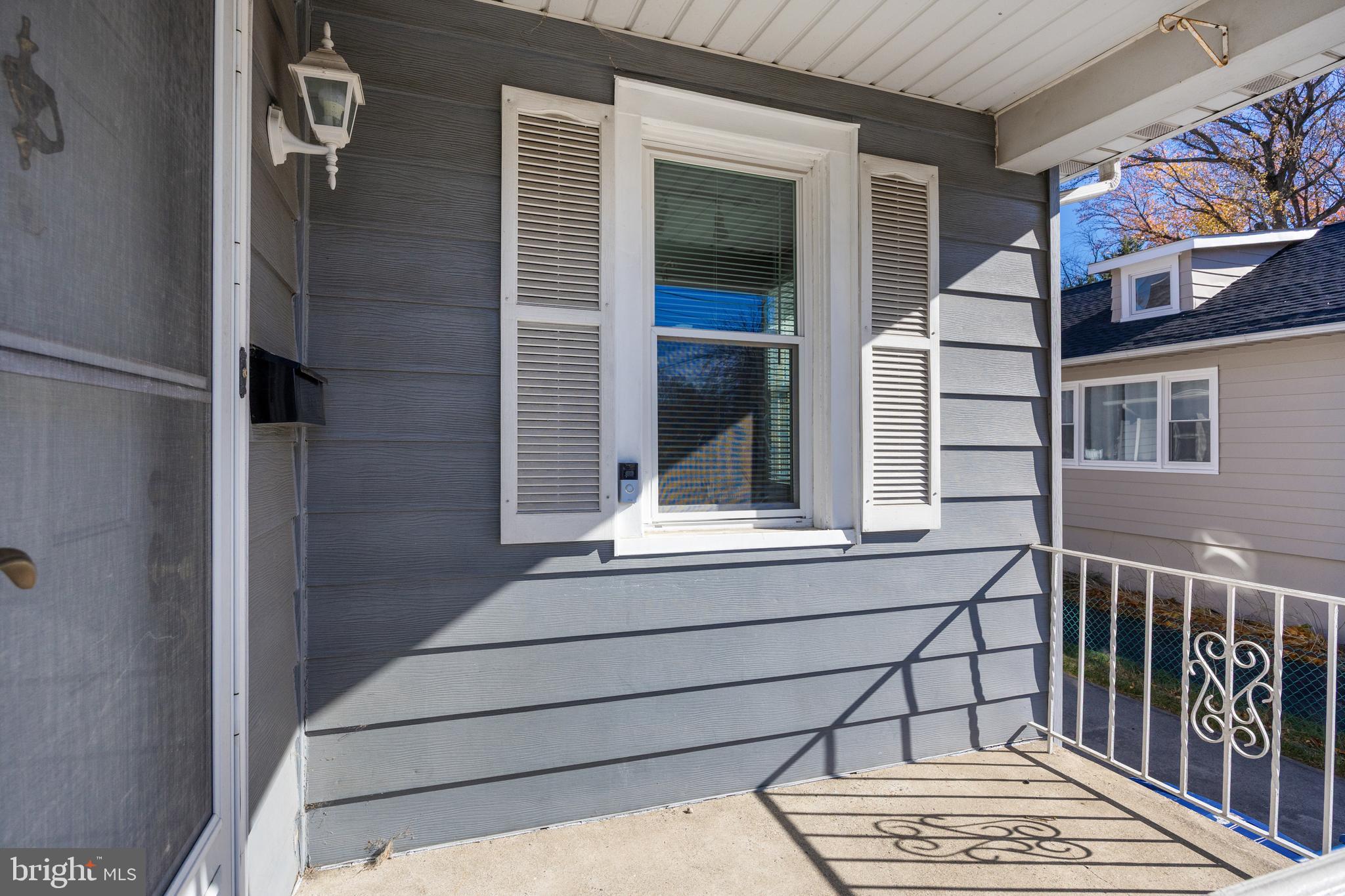 19 South Chestnut Avenue Maple Shade, NJ 08052 - Photo 3 of 31 a view of a balcony with a door and wooden floor