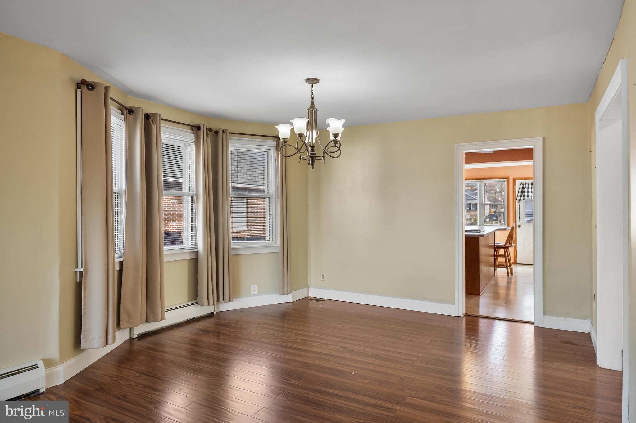 19 South Chestnut Avenue Maple Shade, NJ 08052 - Photo 9 of 31 a view of an empty room with wooden floor and a window