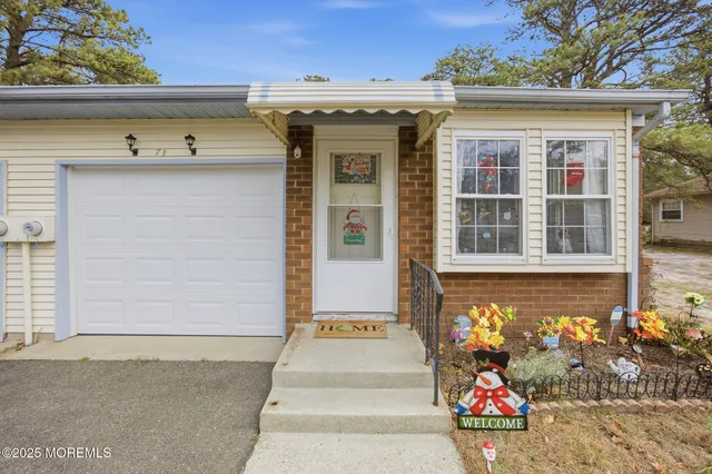 a front view of a house with a space