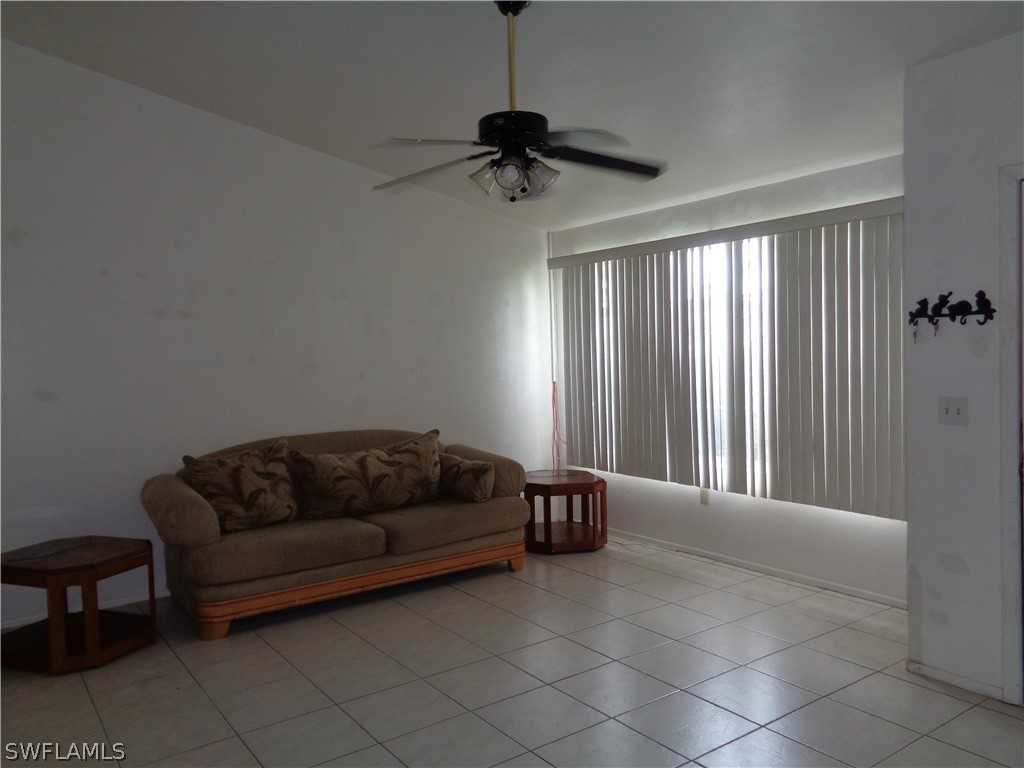 18538 Violet Road Fort Myers, FL 33967 - Photo 4 of 13 a living room with furniture and a window