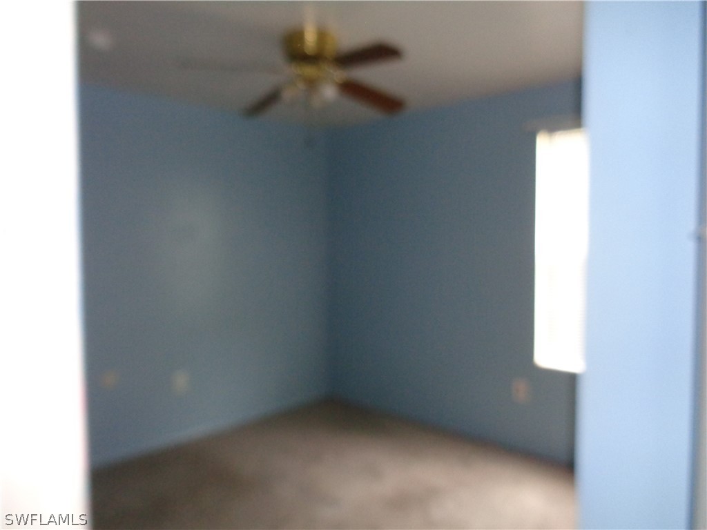 18538 Violet Road Fort Myers, FL 33967 - Photo 6 of 13 a view of an empty room