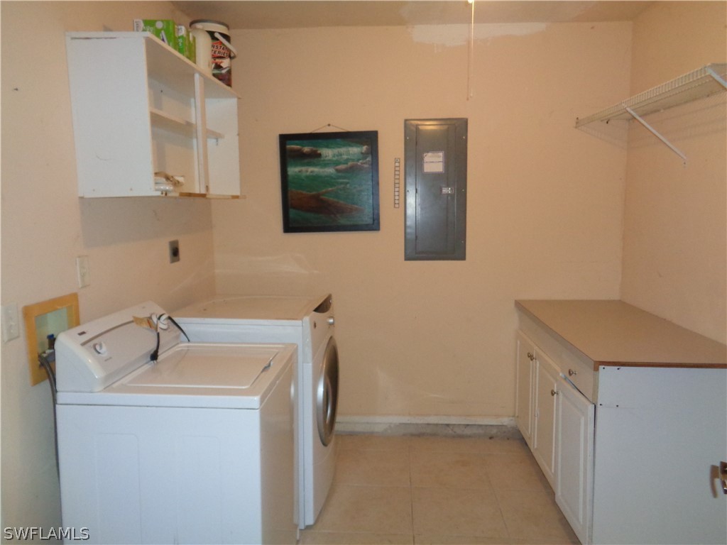 18538 Violet Road Fort Myers, FL 33967 - Photo 9 of 13 a utility room with a sink dryer and washer
