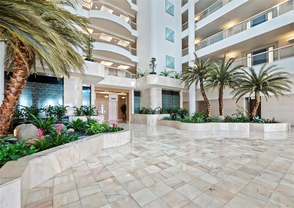 455 Longboat Club Road, Unit 402 Longboat Key, FL 34228 - Photo 28 of 48 a view of multiple house with a yard