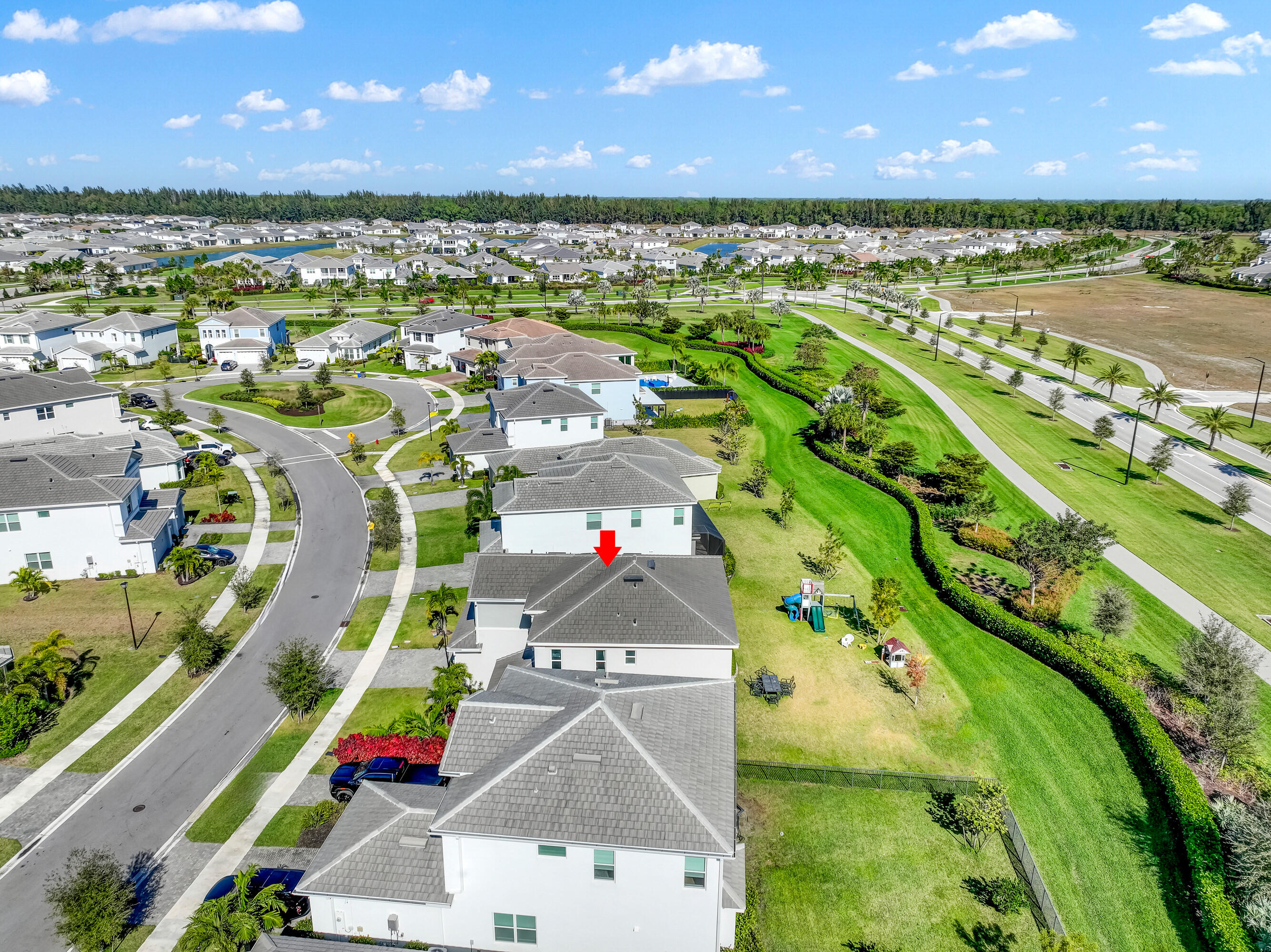 5446 Macoon Way Westlake, FL 33470 - Photo 30 of 40 a view of an outdoor space and a swimming pool