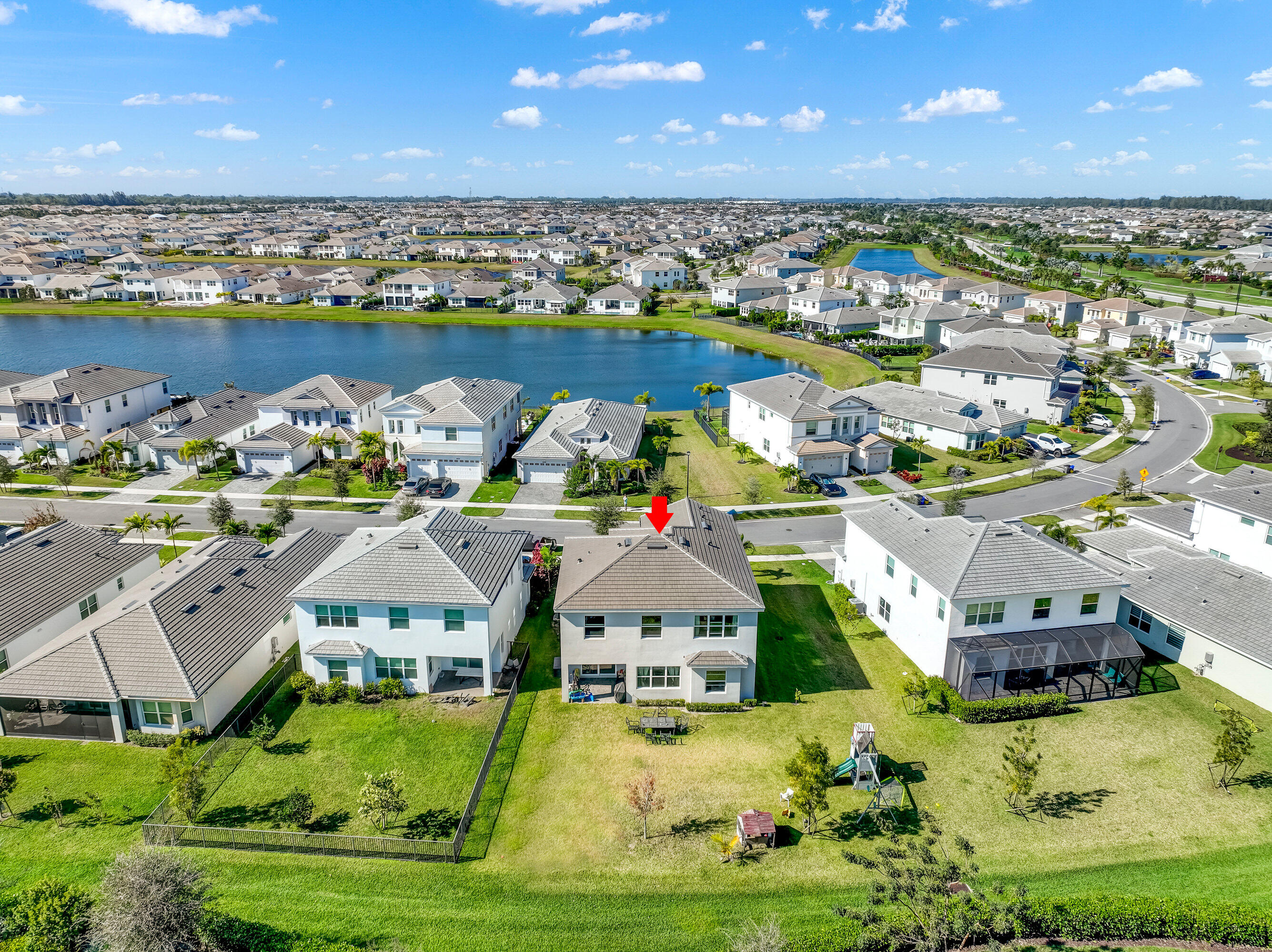 5446 Macoon Way Westlake, FL 33470 - Photo 31 of 40 an aerial view of a house with a ocean view