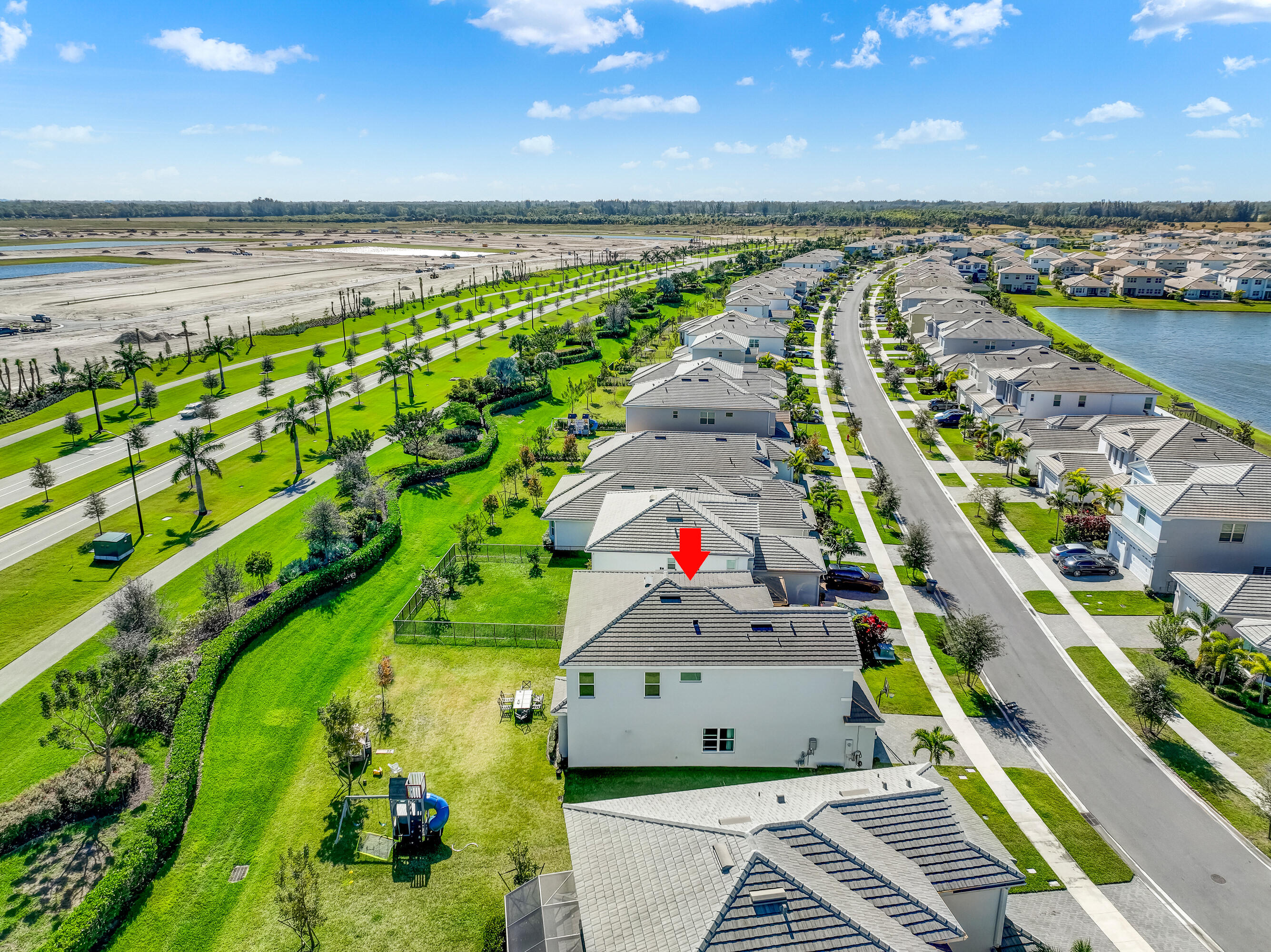 5446 Macoon Way Westlake, FL 33470 - Photo 32 of 40 a view of an outdoor space with a lake view