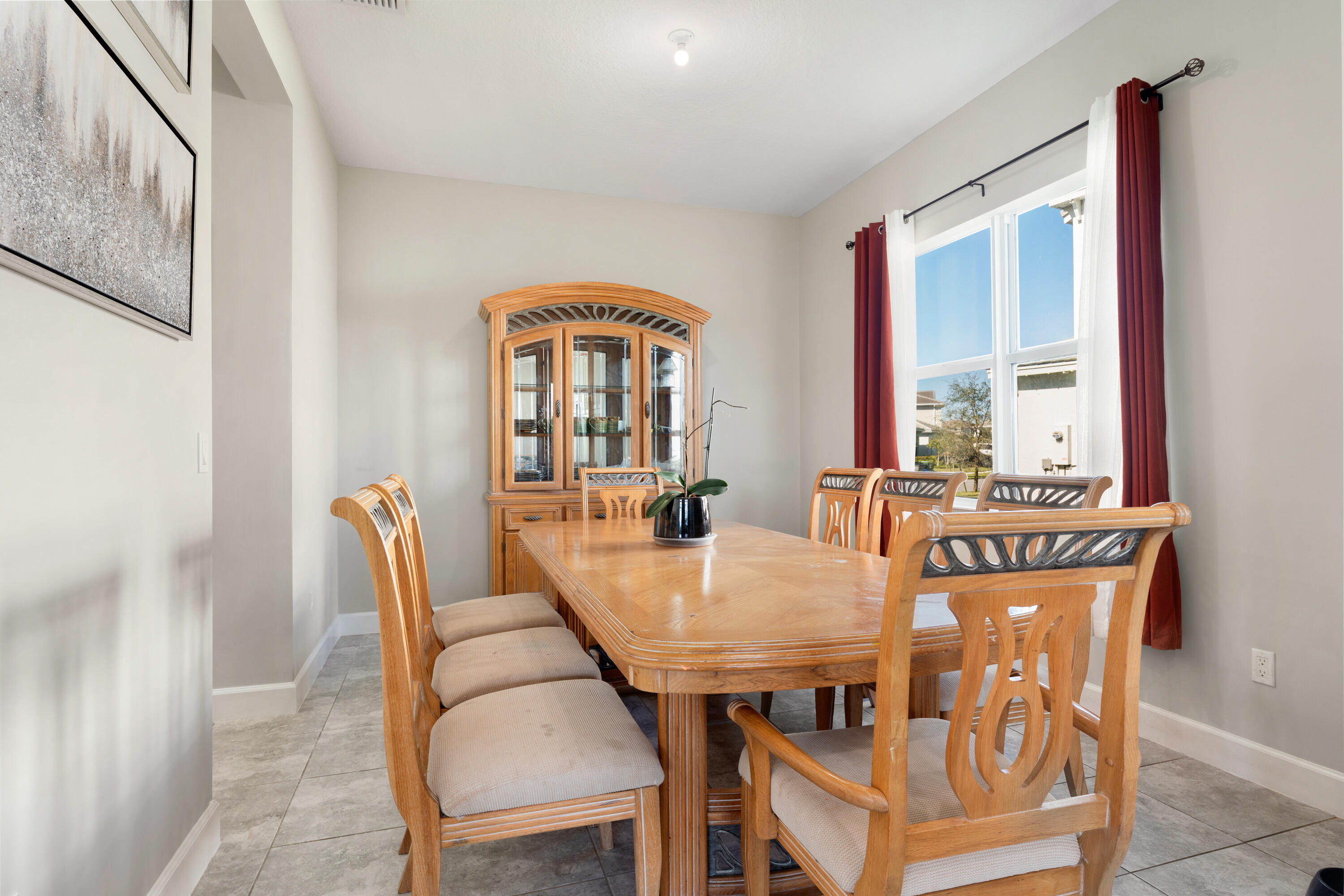 5446 Macoon Way Westlake, FL 33470 - Photo 9 of 40 a view of a dining room with furniture window and outside view