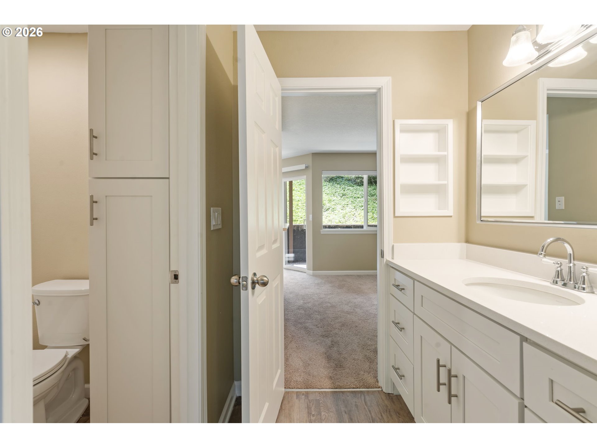 9967 Southeast Talbert Street Clackamas, OR 97015 - Photo 26 of 33 a bathroom with a granite countertop sink mirror and a