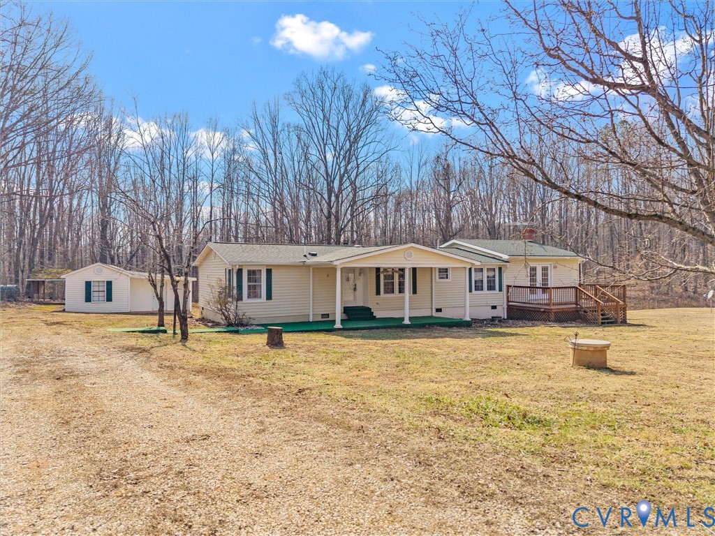 1349 Whispering Road Dillwyn, VA 23936 - Photo 2 of 51 a front view of a house with a yard