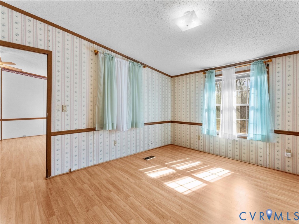 1349 Whispering Road Dillwyn, VA 23936 - Photo 29 of 51 a view of an empty room with a window