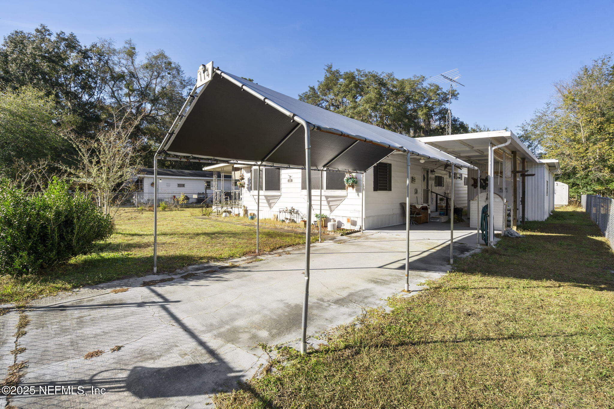 114 Sawyer Street Interlachen, FL 32148 - Photo 23 of 28 a view of a house with backyard