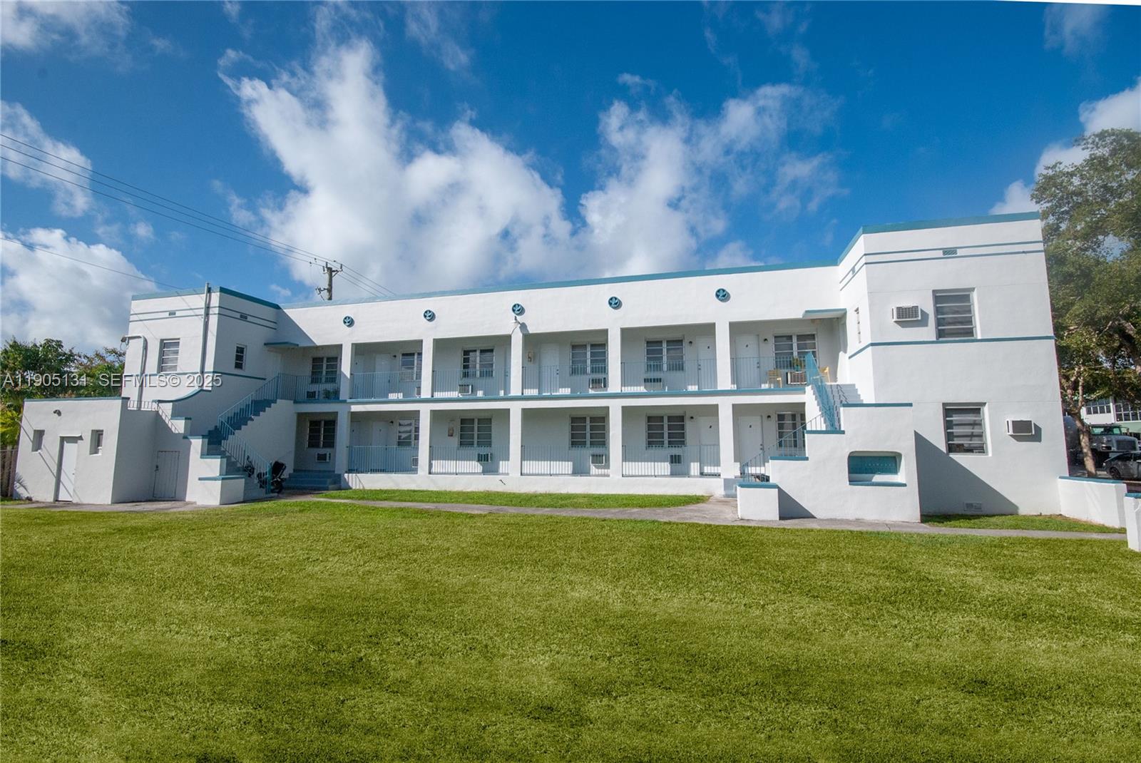 a large building with a big yard