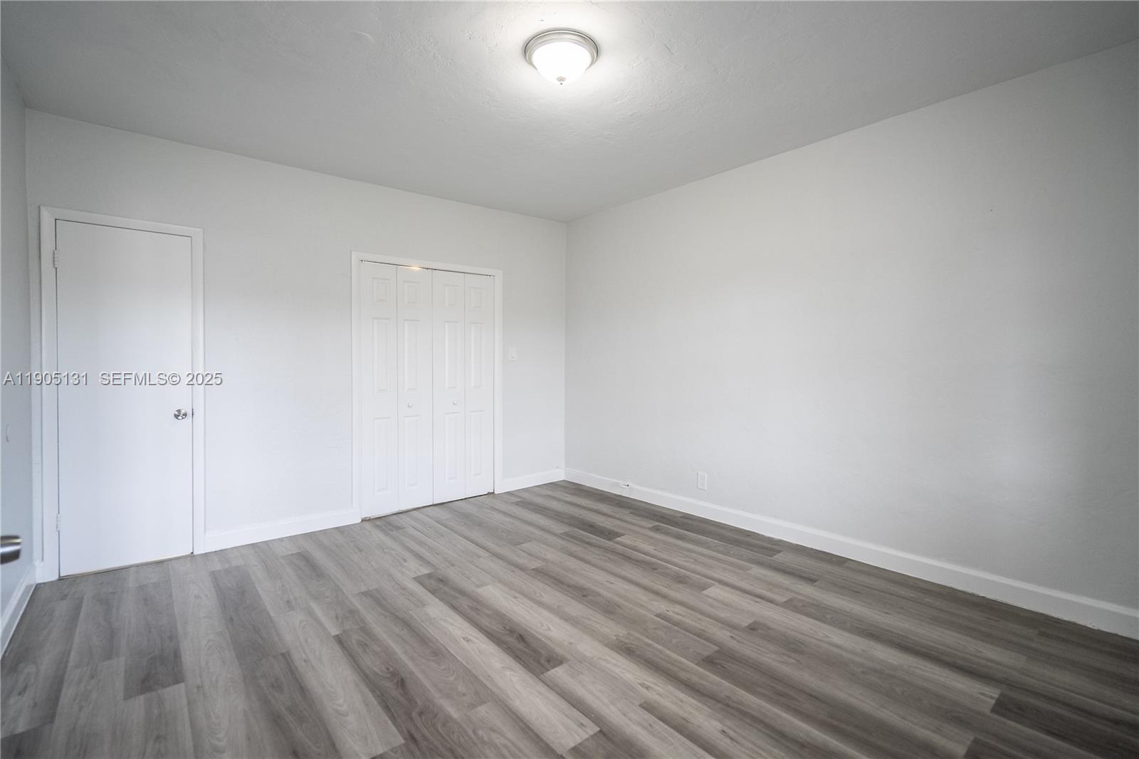 1208 71st Street, Unit 7 Miami Beach, FL 33141 - Photo 8 of 14 wooden floor in a room