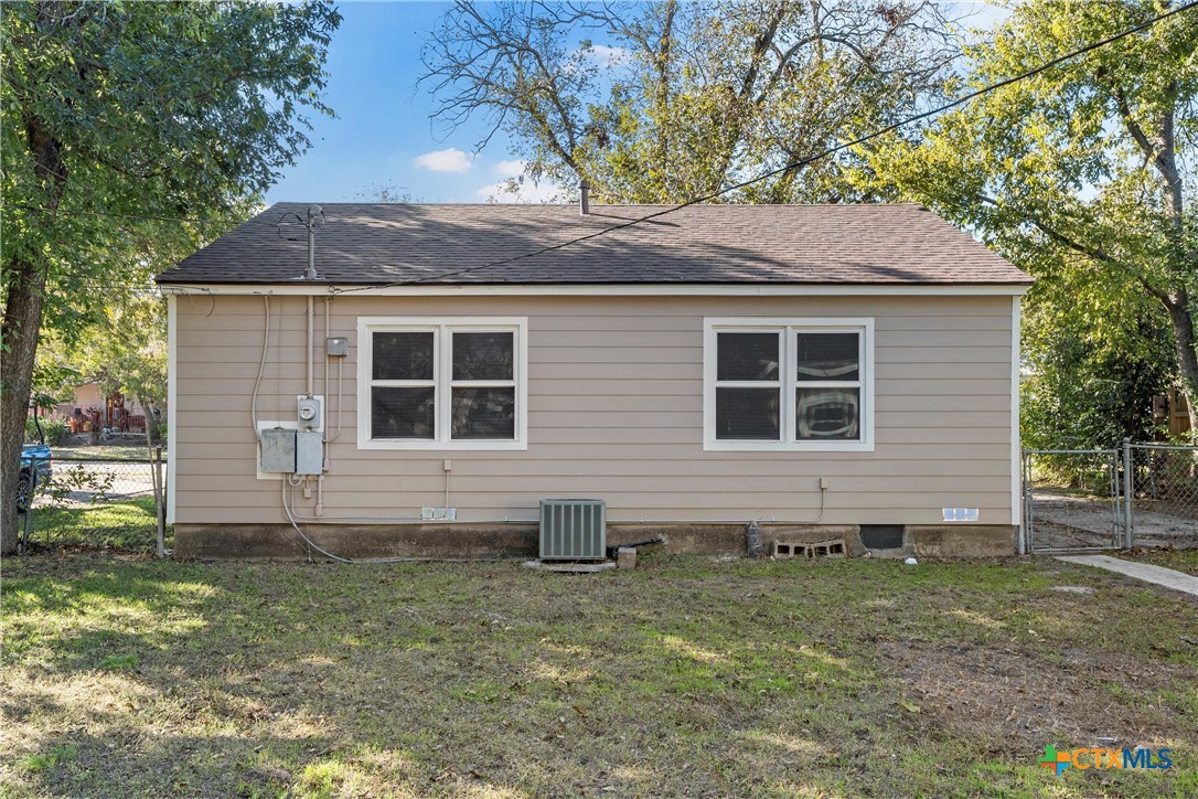 1203 South 5th Street Temple, TX 76504 - Photo 15 of 18 a front view of a house with garden