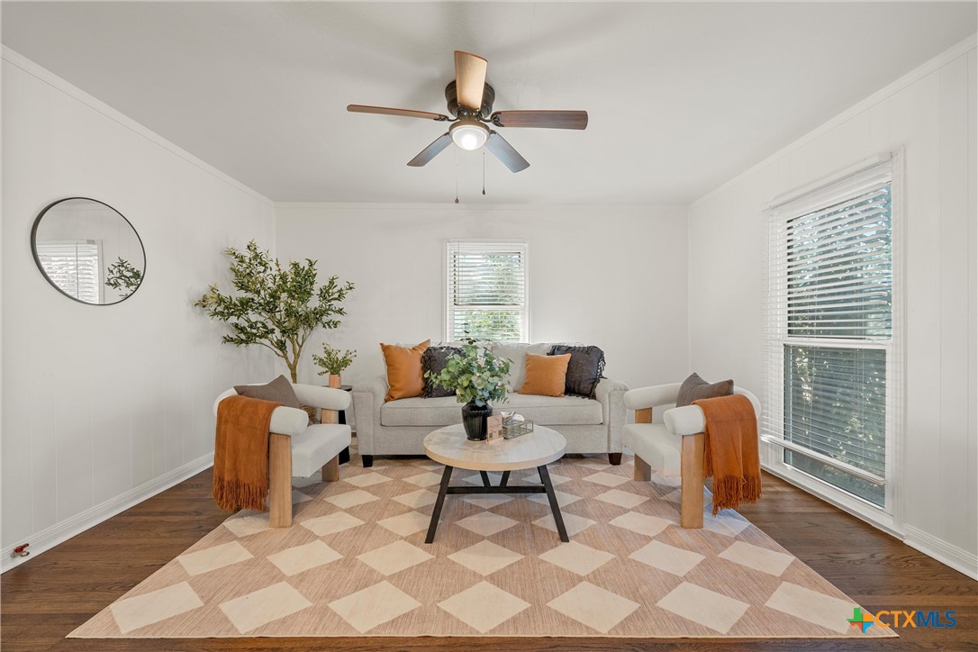 1203 South 5th Street Temple, TX 76504 - Photo 2 of 18 a living room with furniture a table and a window