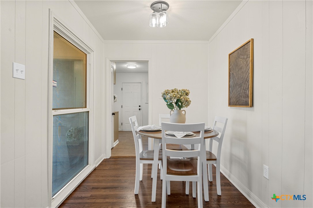 1203 South 5th Street Temple, TX 76504 - Photo 4 of 18 a dining room with furniture and window