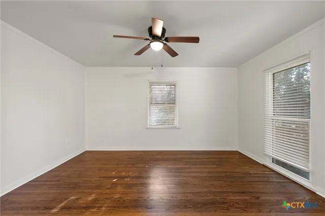 a kitchen with a stove and a microwave