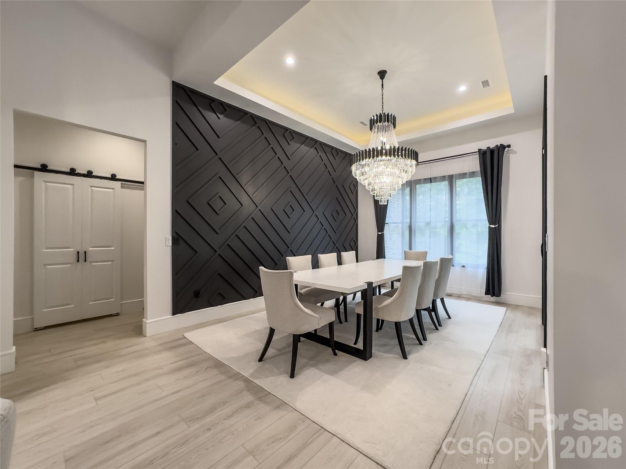 668 Players Ridge Road Hickory, NC 28601 - Photo 11 of 48 a view of a dining room with furniture and window