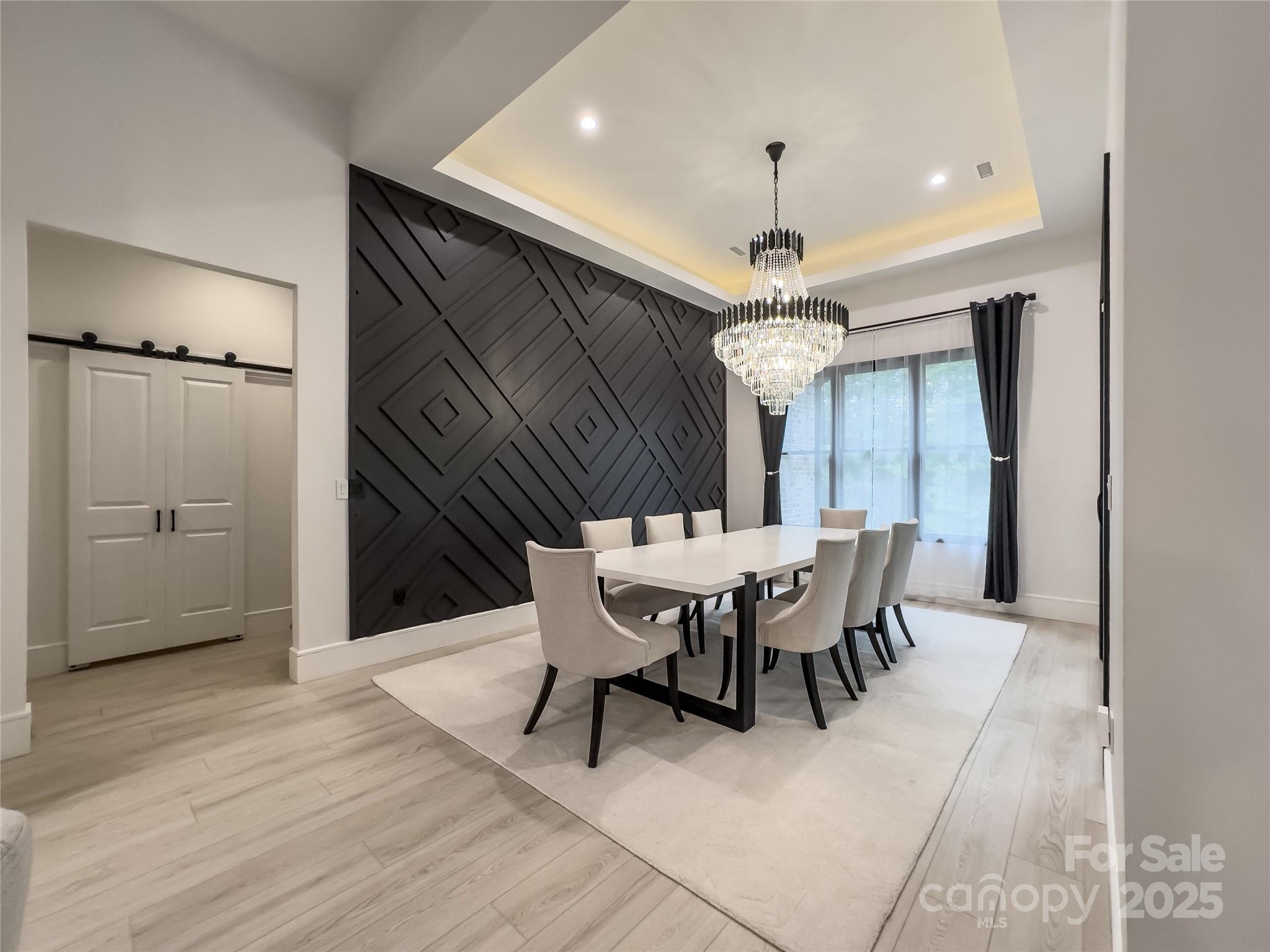668 Players Ridge Road Hickory, NC 28601 - Photo 11 of 48 a view of a dining room with furniture and window