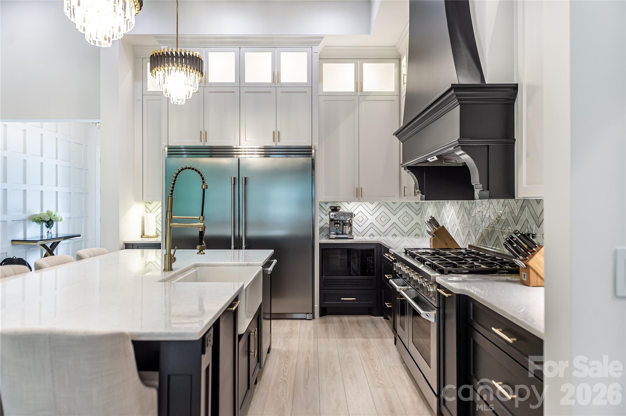 668 Players Ridge Road Hickory, NC 28601 - Photo 12 of 48 a kitchen with kitchen island stainless steel appliances a sink stove and refrigerator