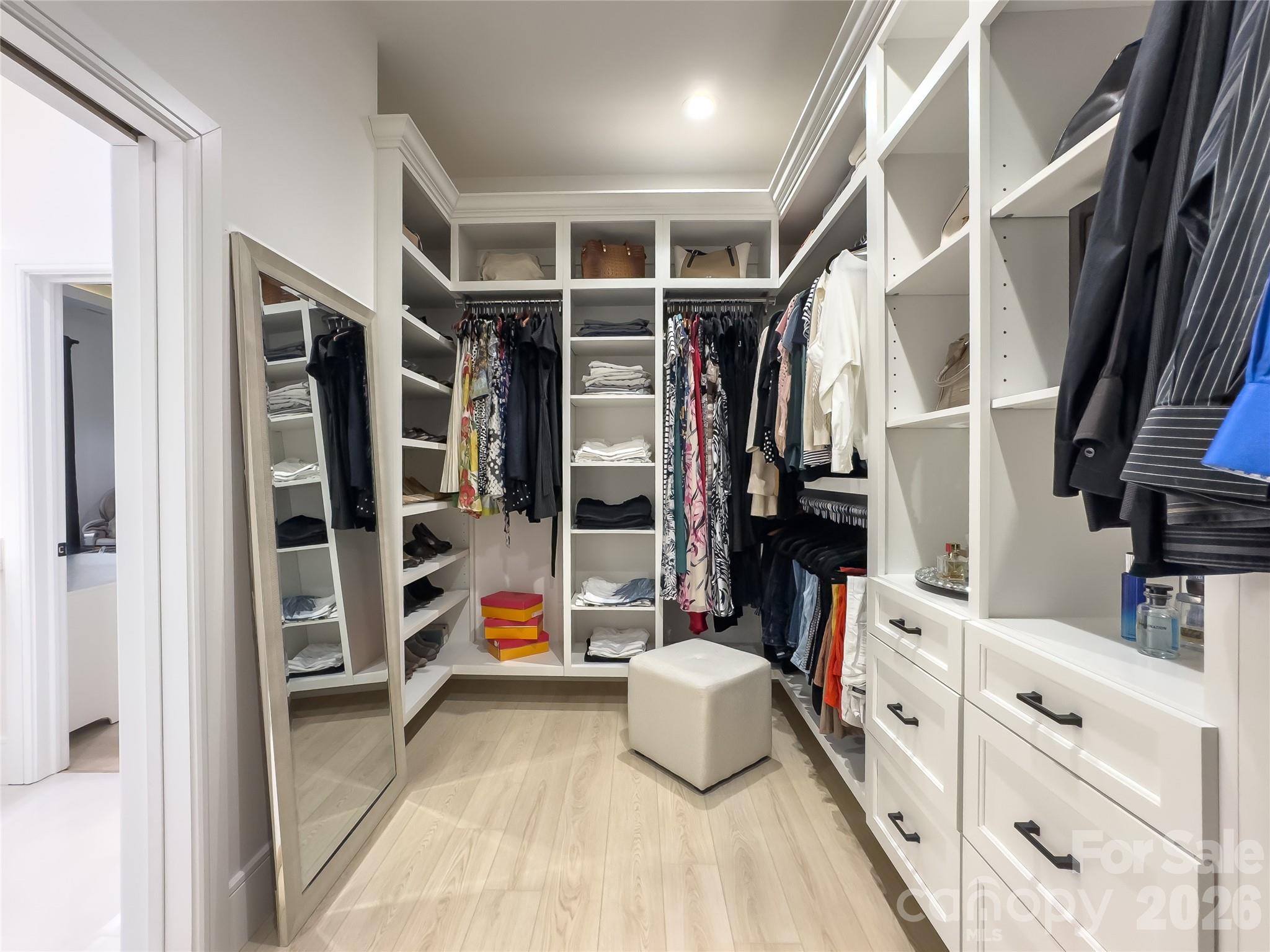 668 Players Ridge Road Hickory, NC 28601 - Photo 23 of 48 a view of walk in closet with clothes and shoes
