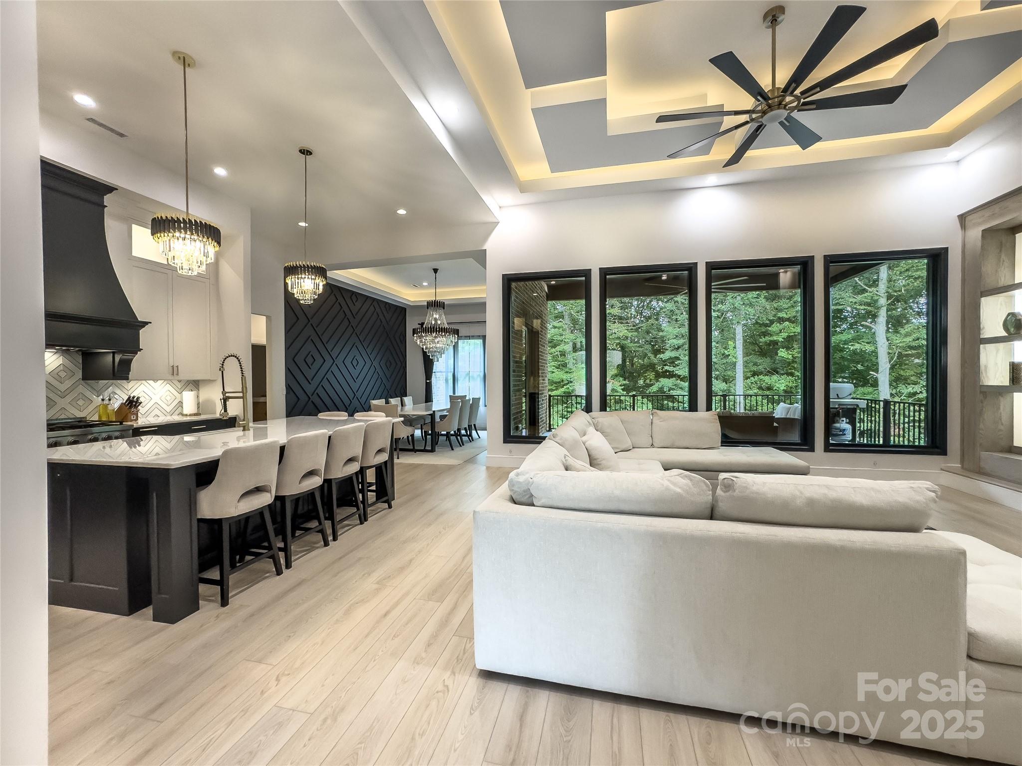 668 Players Ridge Road Hickory, NC 28601 - Photo 3 of 48 a living room with furniture and a large window