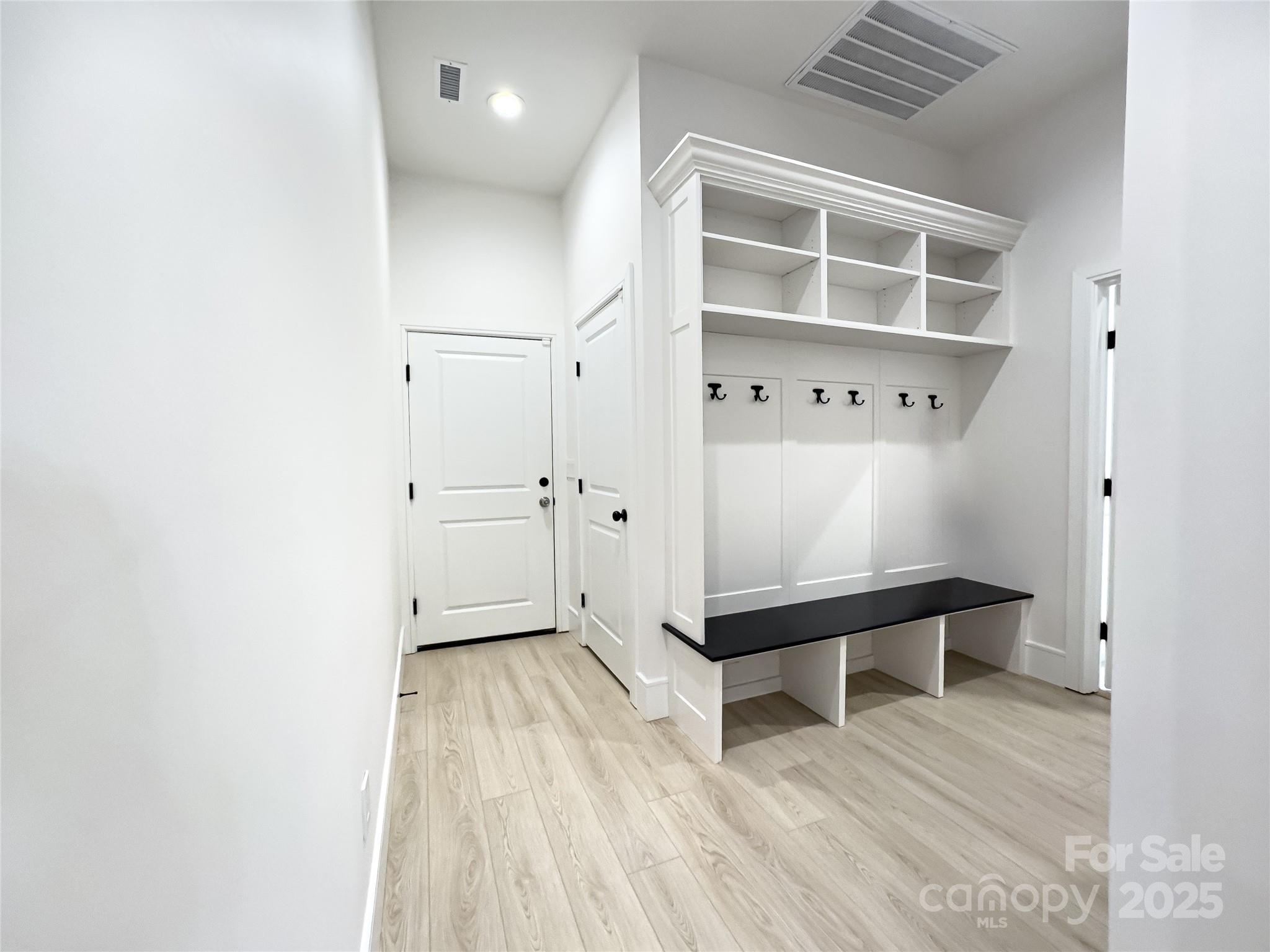 668 Players Ridge Road Hickory, NC 28601 - Photo 31 of 48 a view of an empty room with wooden floor and a window