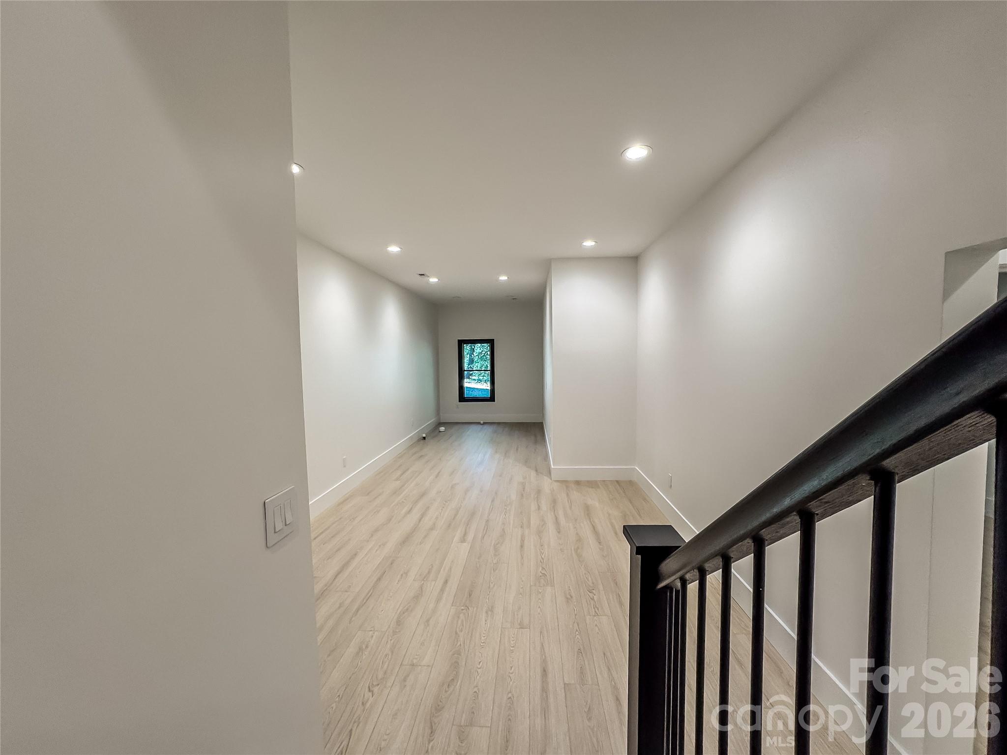 668 Players Ridge Road Hickory, NC 28601 - Photo 34 of 48 a view of hallway with stairs