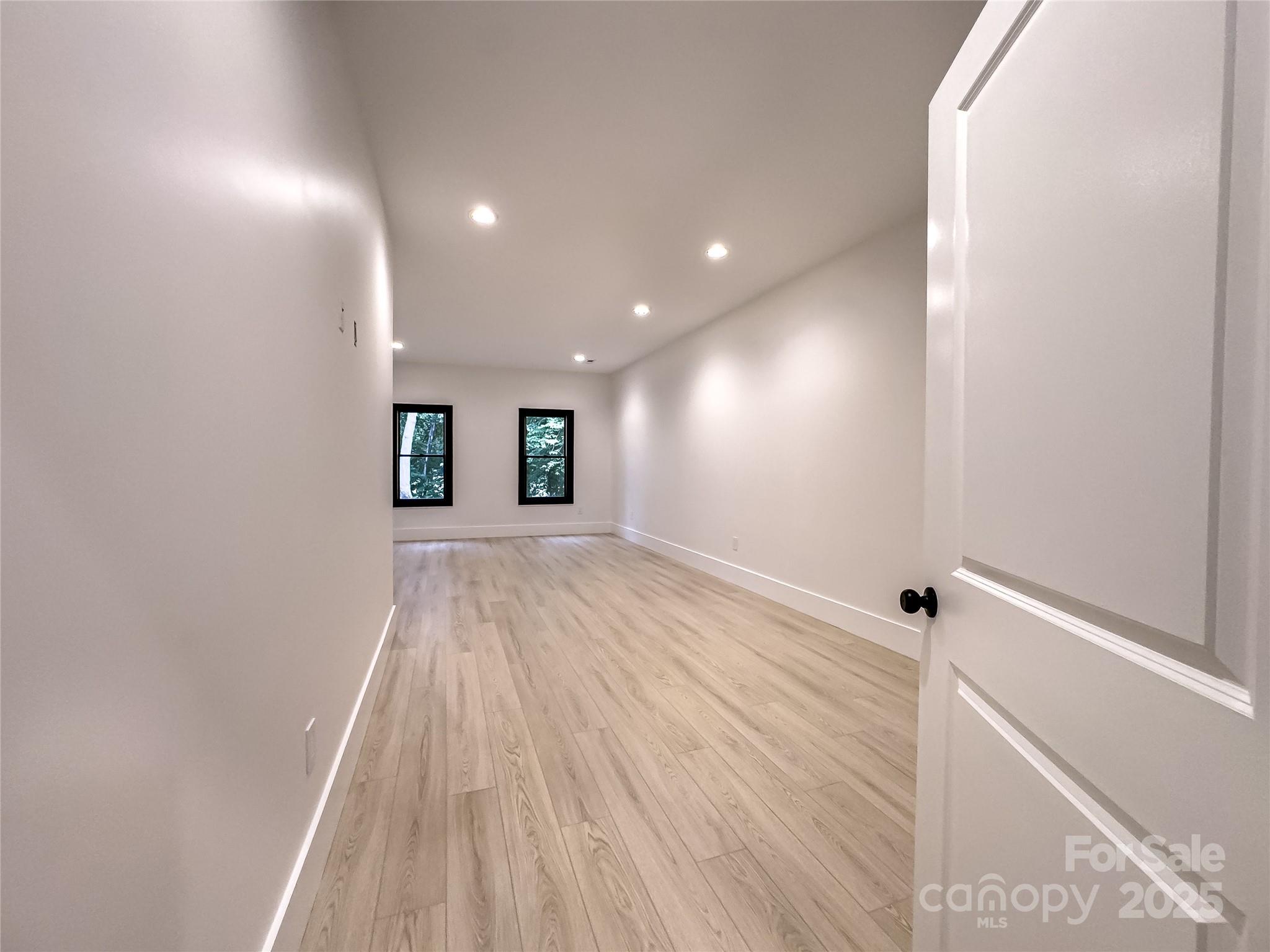 668 Players Ridge Road Hickory, NC 28601 - Photo 36 of 48 a view of a room with wooden floor and window