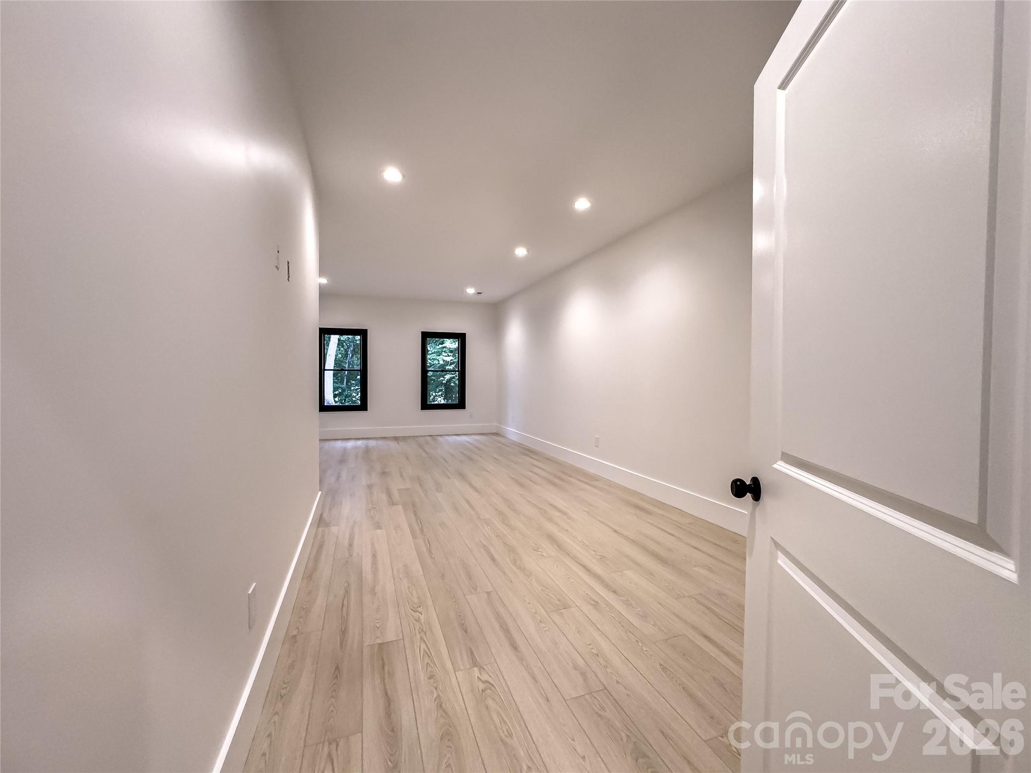 668 Players Ridge Road Hickory, NC 28601 - Photo 36 of 48 a view of a room with wooden floor and window