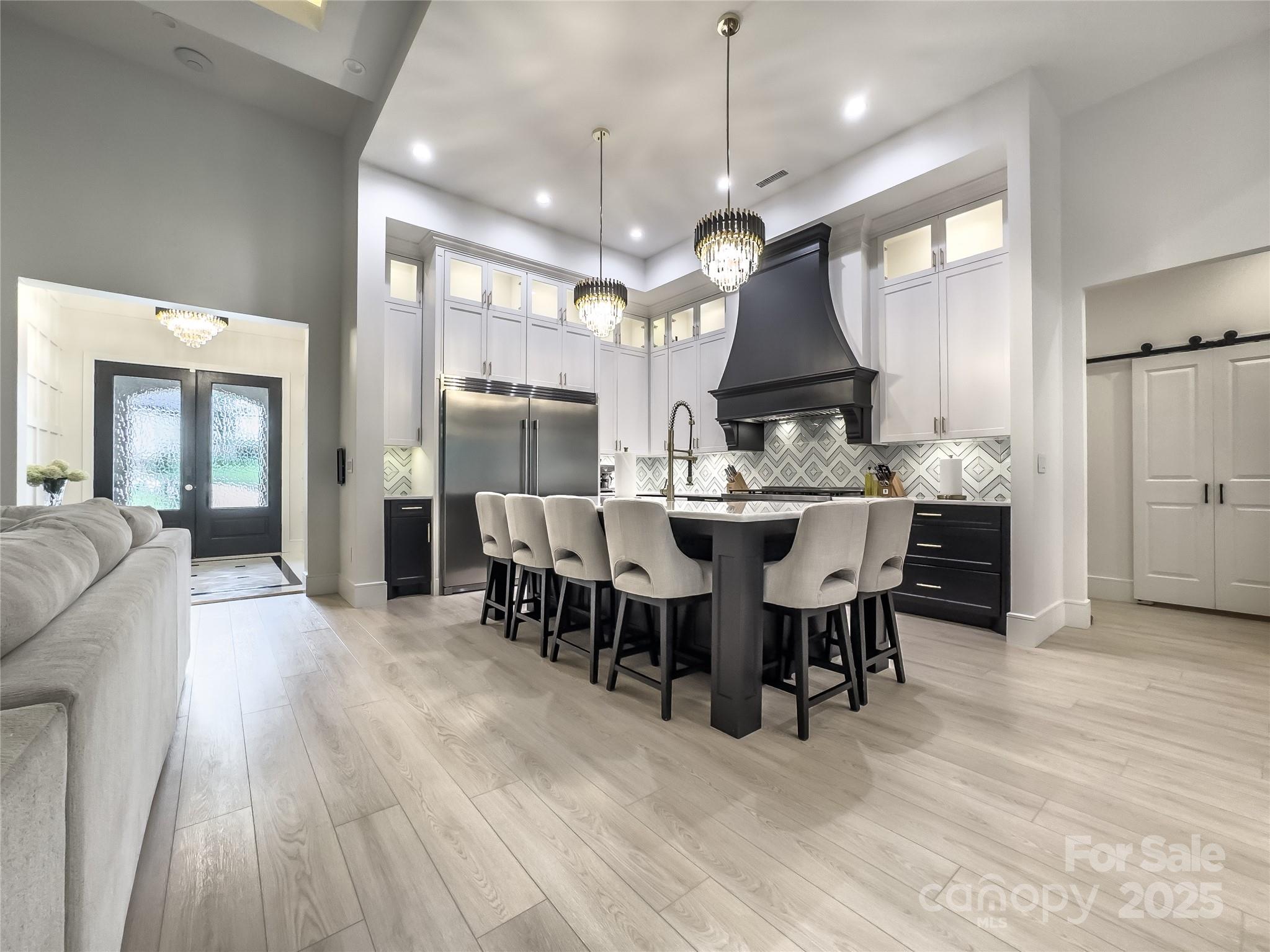 668 Players Ridge Road Hickory, NC 28601 - Photo 4 of 48 a view of a dining room with furniture window and wooden floor