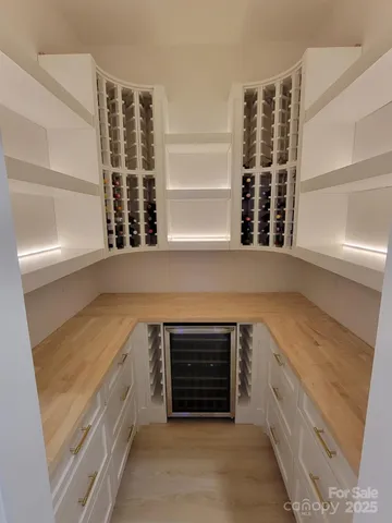 a kitchen with a stove and a window