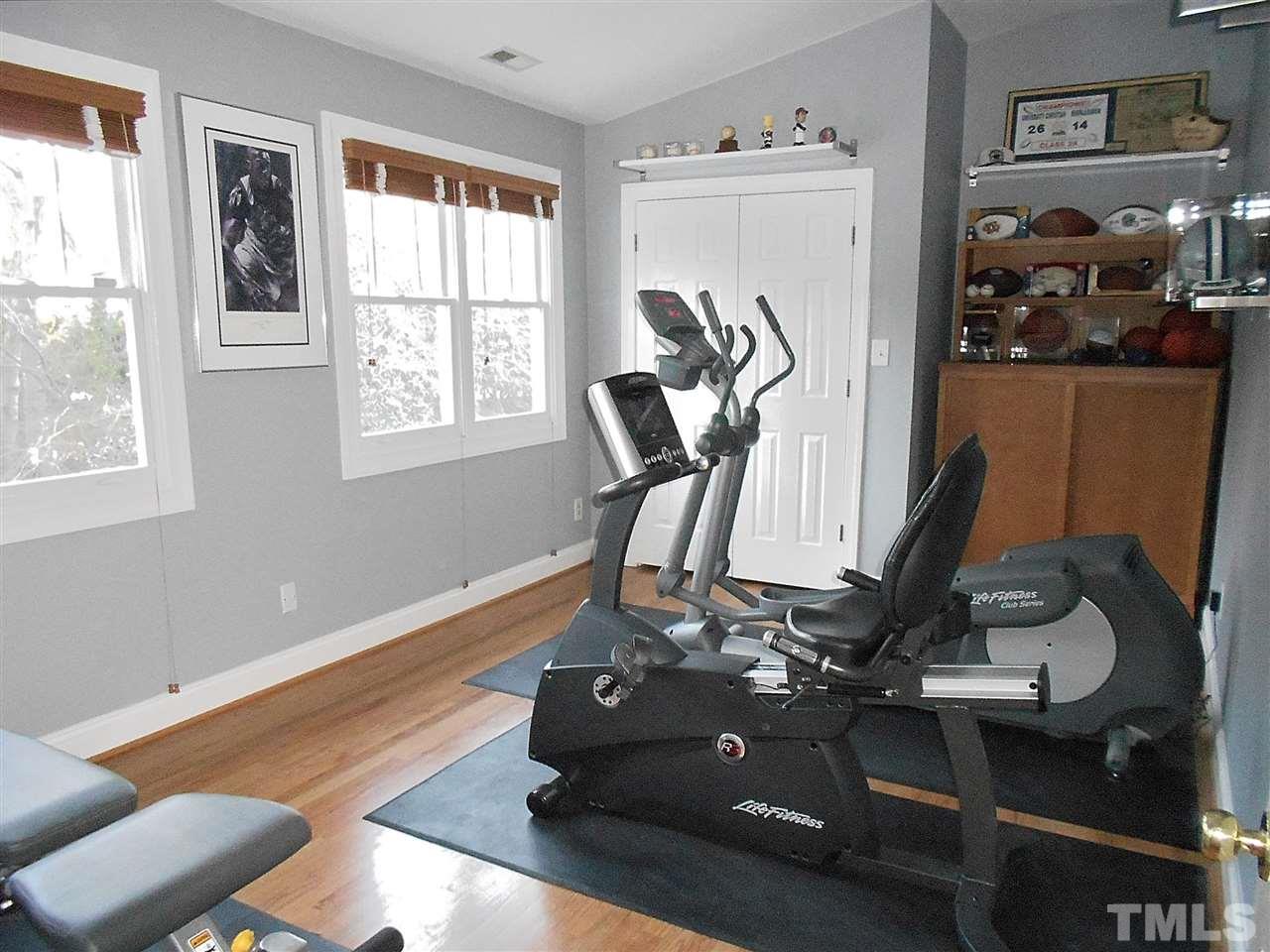 309 Forsyth Street Raleigh, NC 27609 - Photo 23 of 25 a room with gym equipment