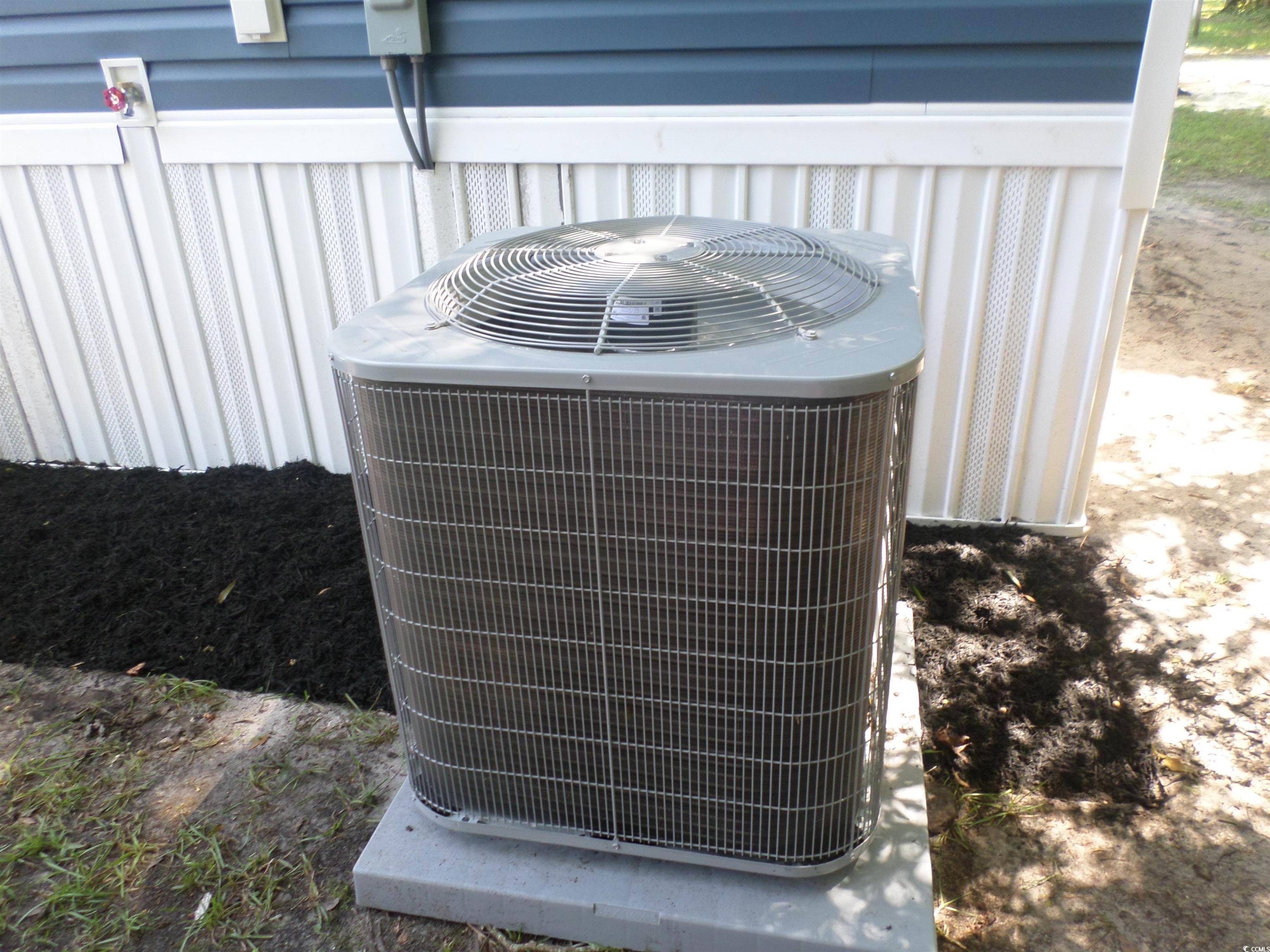 533 Key Largo Avenue Murrells Inlet, SC 29576 - Photo 6 of 21 Exterior view of a central air condition unit