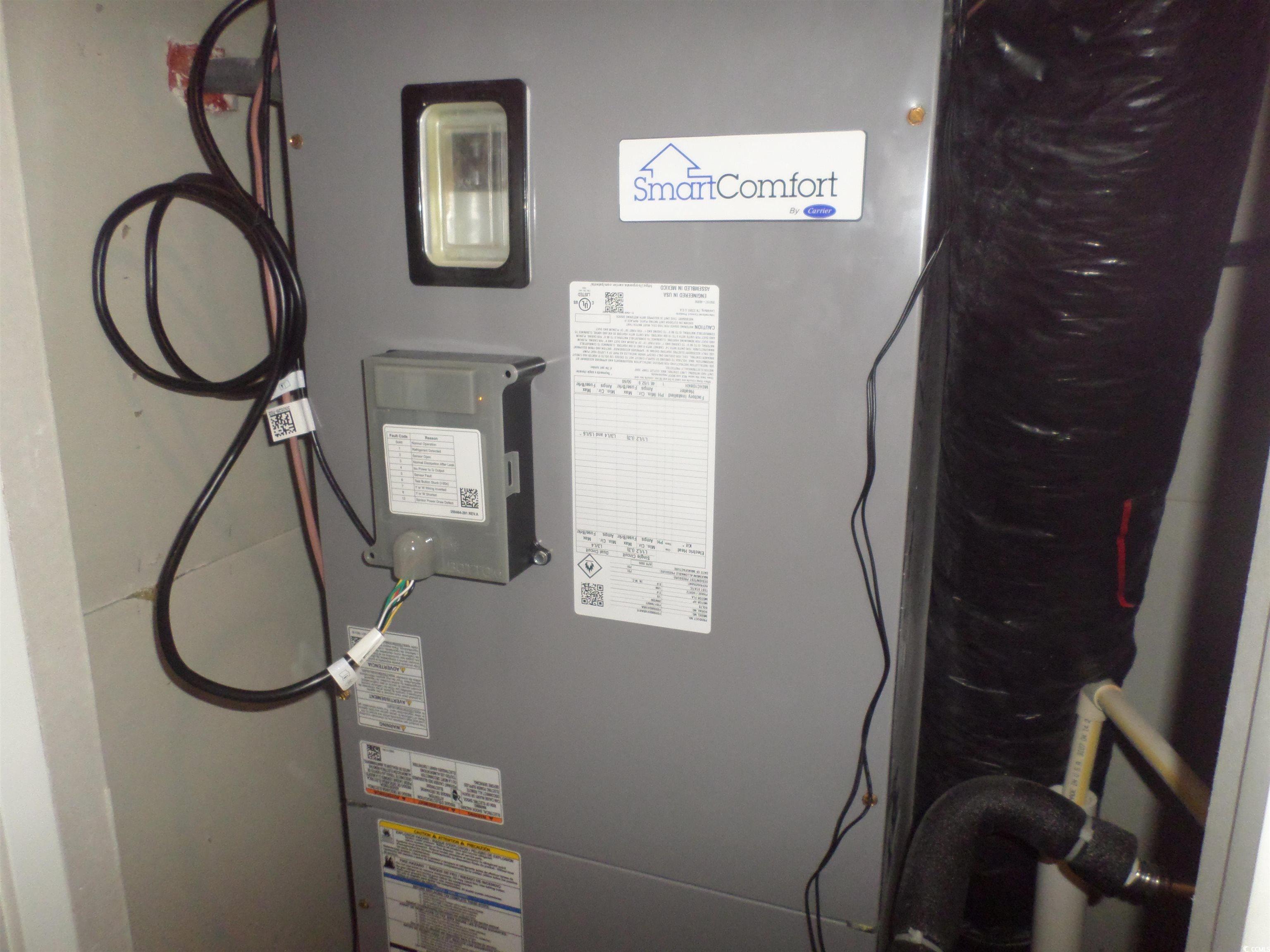 533 Key Largo Avenue Murrells Inlet, SC 29576 - Photo 8 of 21 Utility room with heating unit