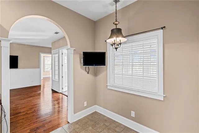 a kitchen with stainless steel appliances granite countertop wooden cabinets a sink and dishwasher