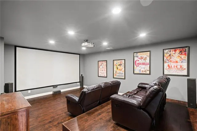 a view of deck with wooden floor and trees