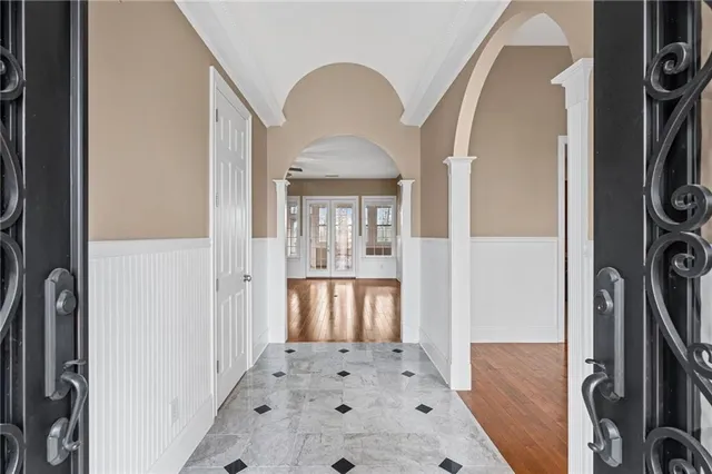 a view of a hallway with a washer and dryer