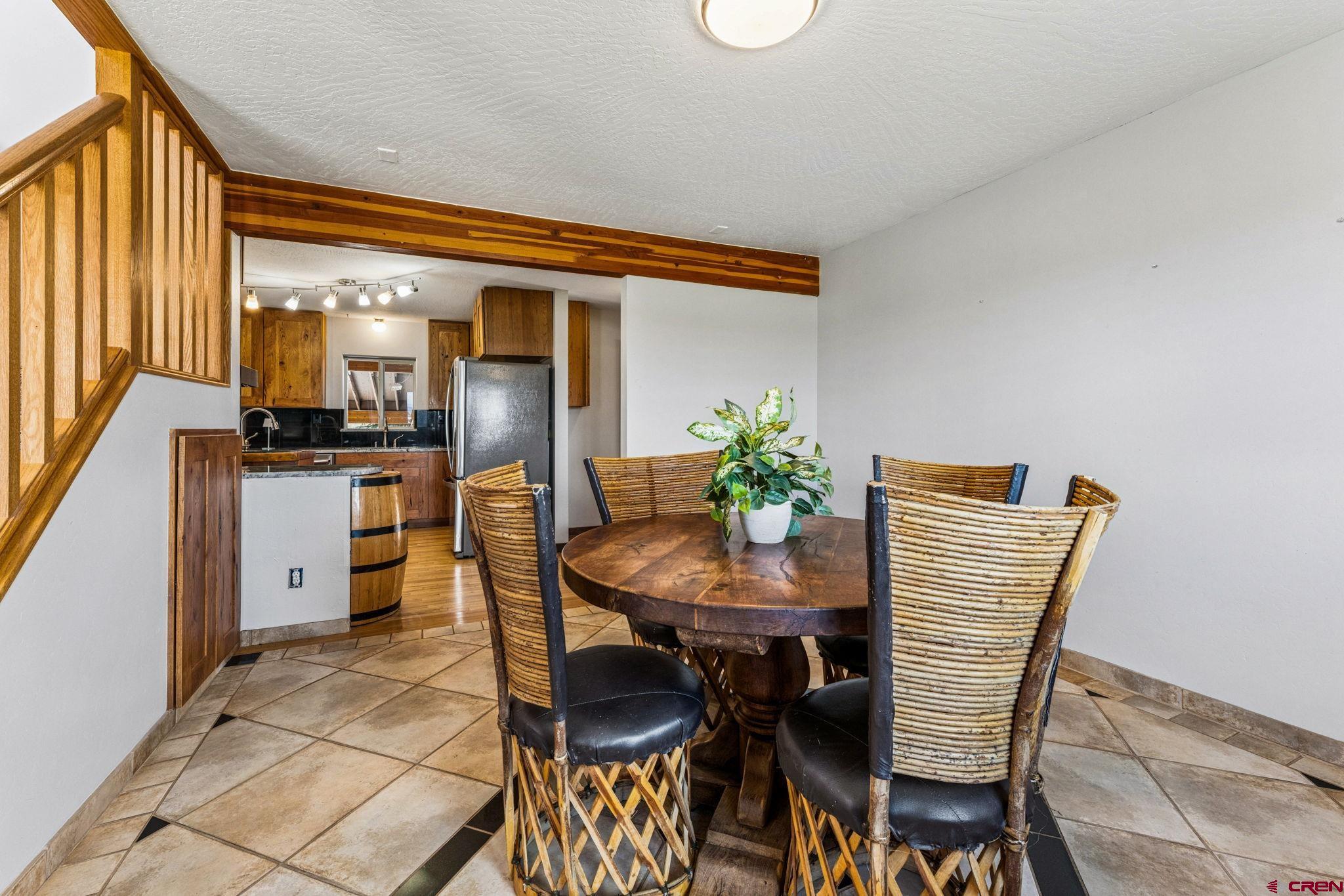 22480 Rd L Cortez, CO 81321 - Photo 13 of 44 a view of a dining room with furniture and window