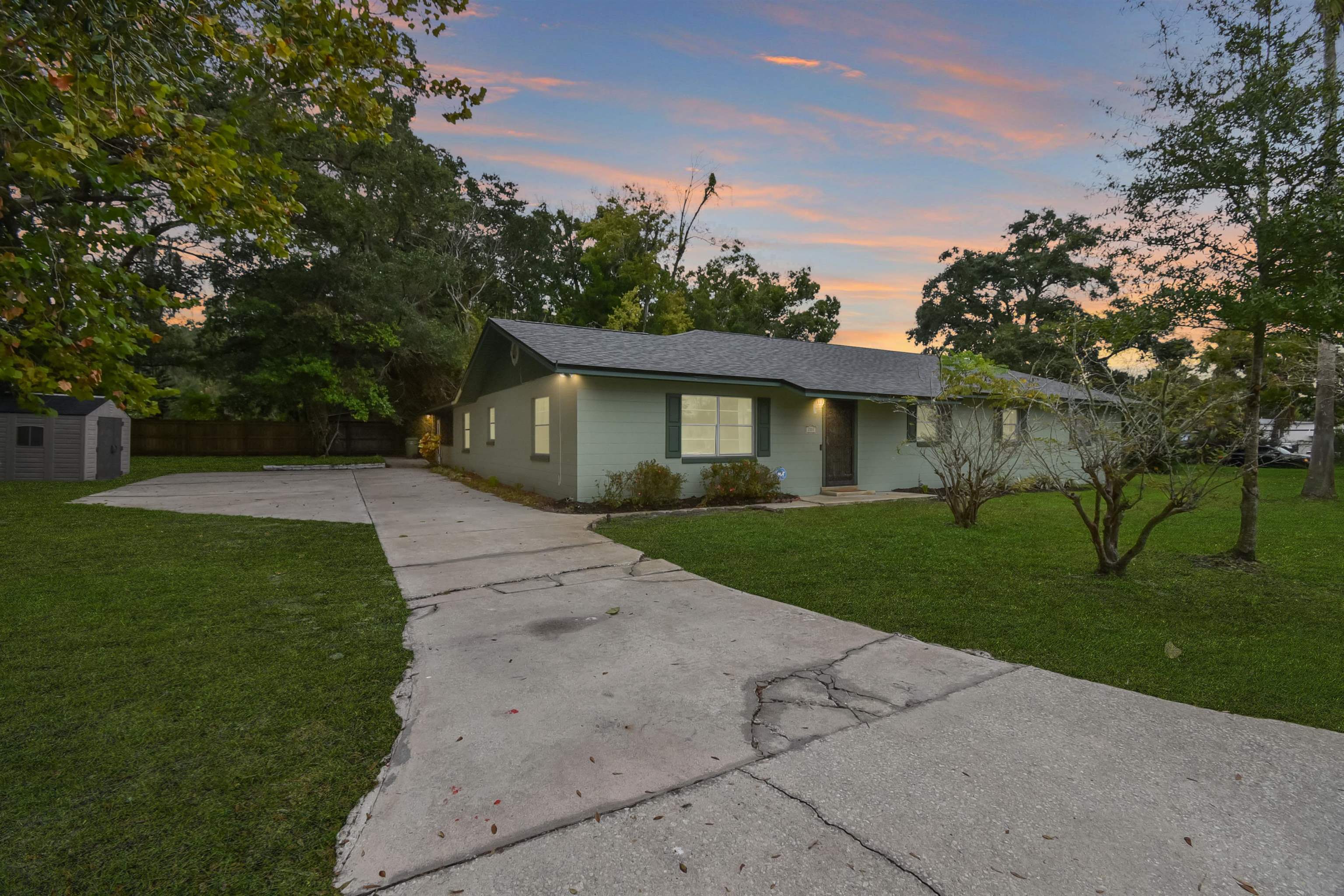 front view of a house with a yard