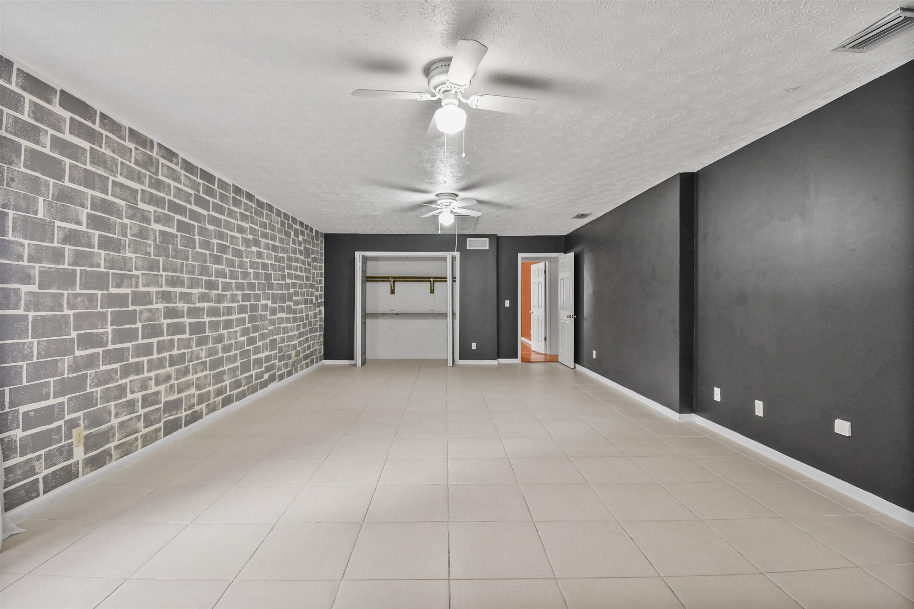 200 Theodore Street St. Augustine, FL 32084 - Photo 11 of 22 a view of empty room with a ceiling fan and window