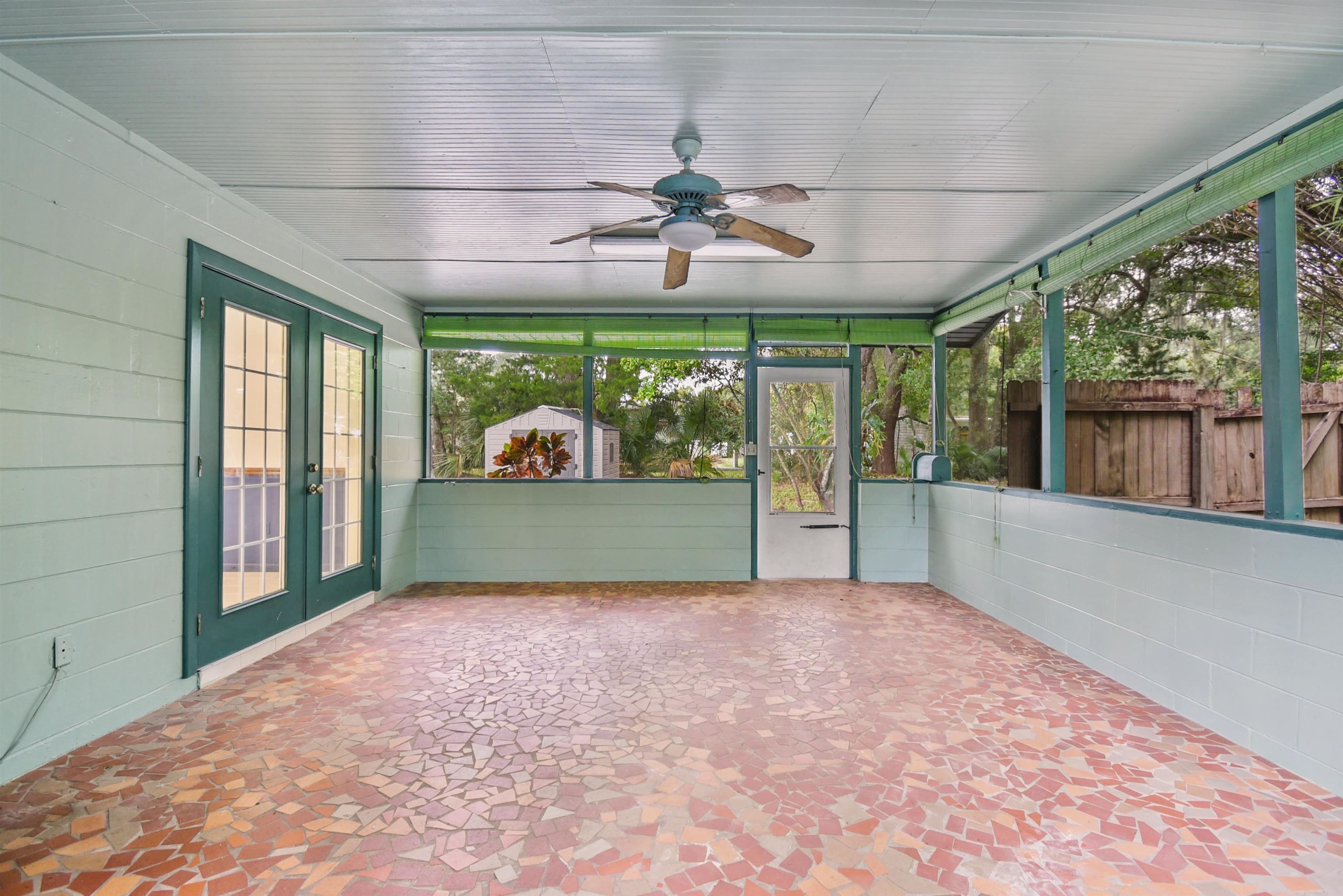 200 Theodore Street St. Augustine, FL 32084 - Photo 18 of 22 wooden floor in an empty room with a fireplace