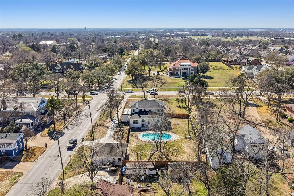 702 Griffith Avenue Terrell, TX 75160 - Photo 39 of 40 Aerial perspective of suburban area with a pool