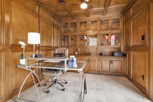 a open kitchen with a sink and cabinets