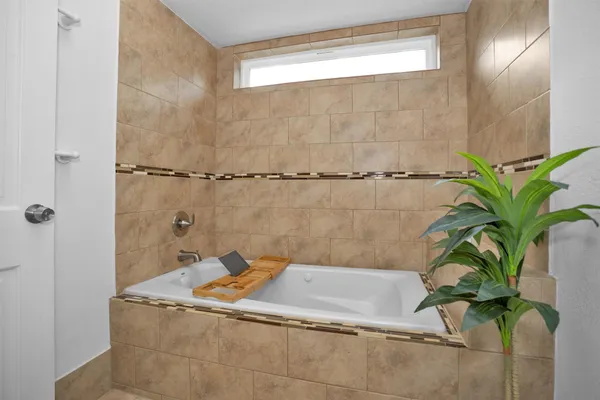 a bathroom with a bathtub