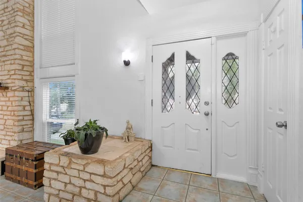 a view of a livingroom with furniture and window