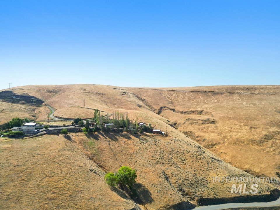 2026 Silcott Hills Road Clarkston, WA 99403 - Photo 26 of 29 Aerial view of property and surrounding area with rural landscape