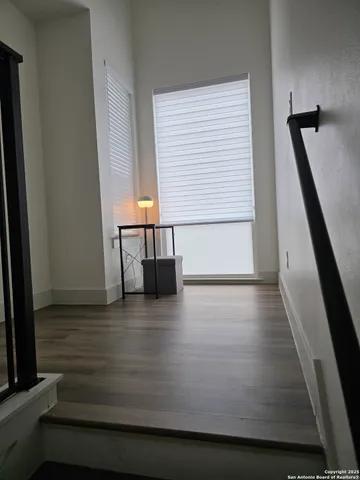 a view of entryway with wooden floor