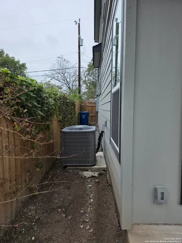 a kitchen with a sink dishwasher a stove and a refrigerator with wooden floor