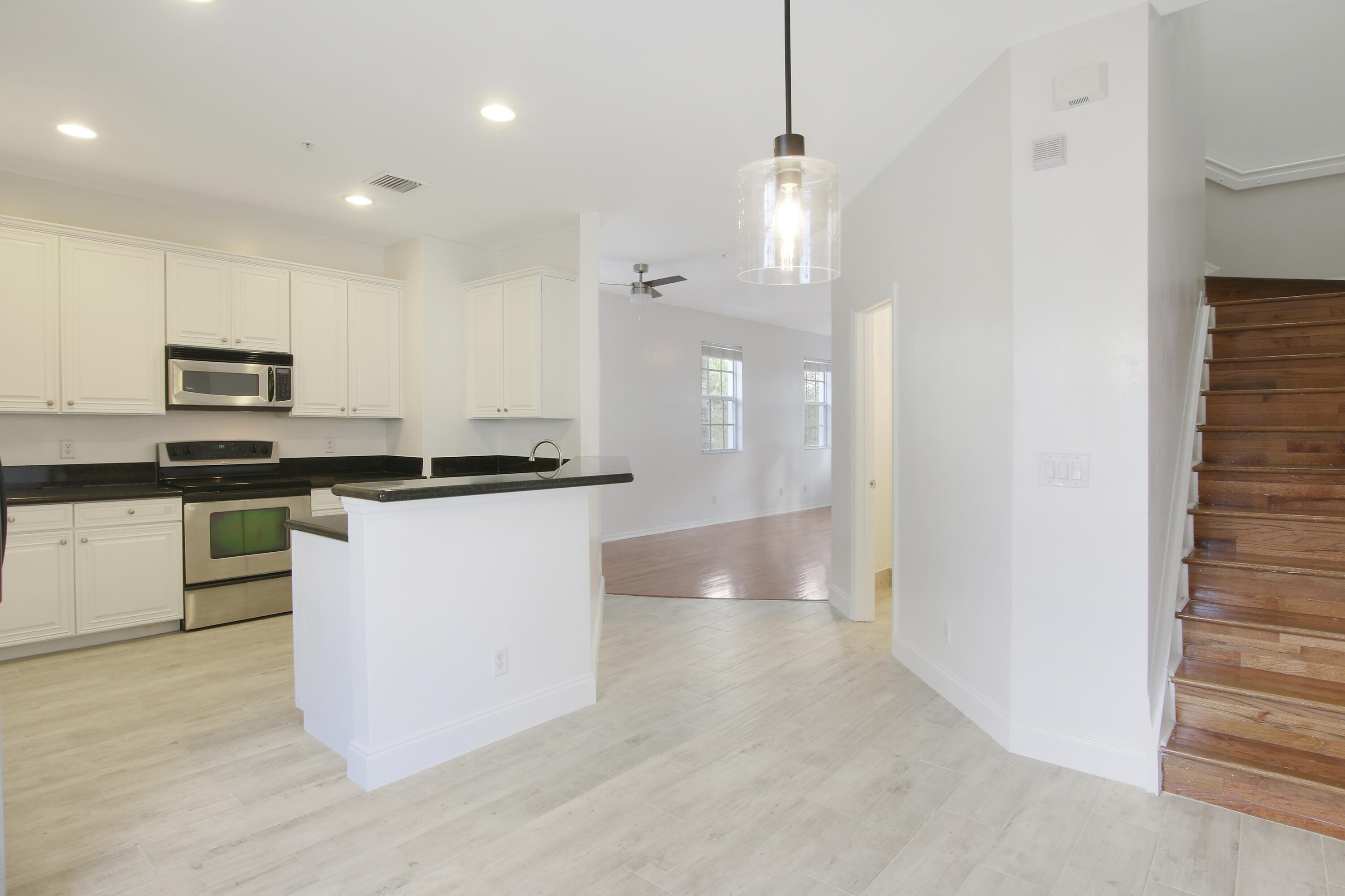 108 Locustberry Lane, Unit 105 Jupiter, FL 33458 - Photo 11 of 36 Kitchen & Dining Room